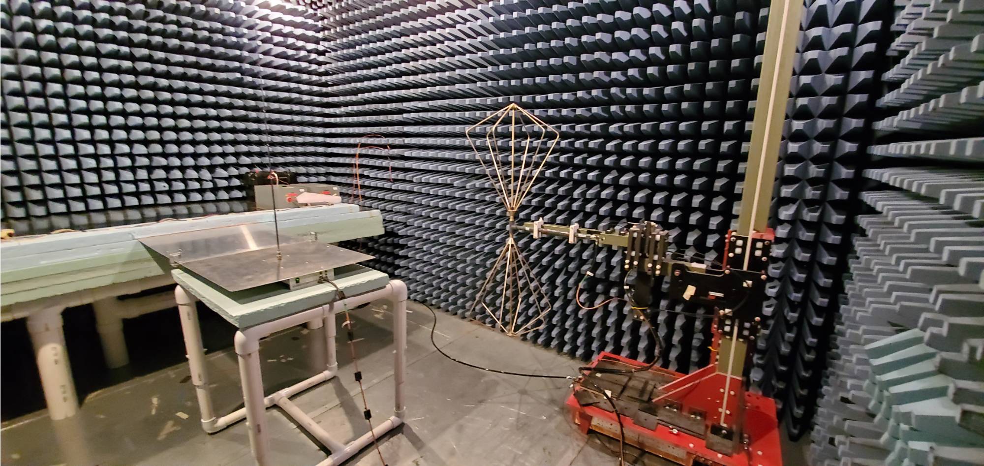 an antenna inside of a chamber at the EMC Center